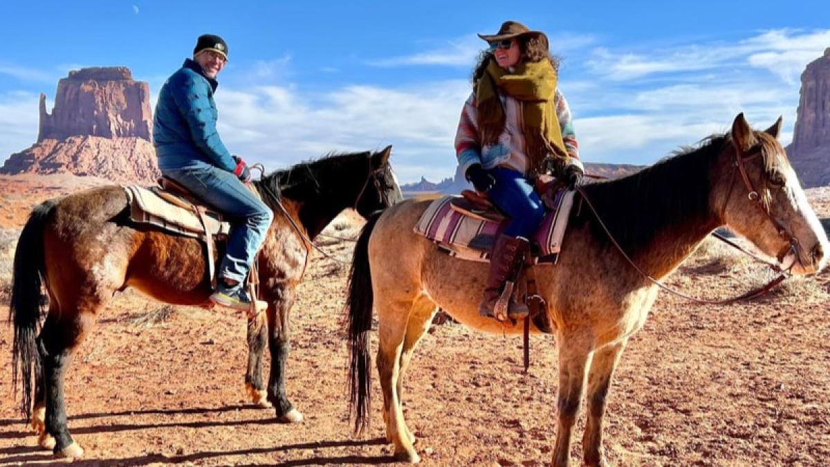 Two people on horseback