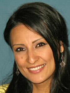 Photo of Vanessa Galaviz, a young Latina woman with long hair